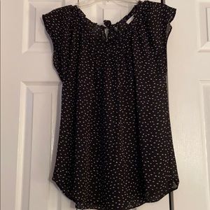 Black blouse with small white flowers